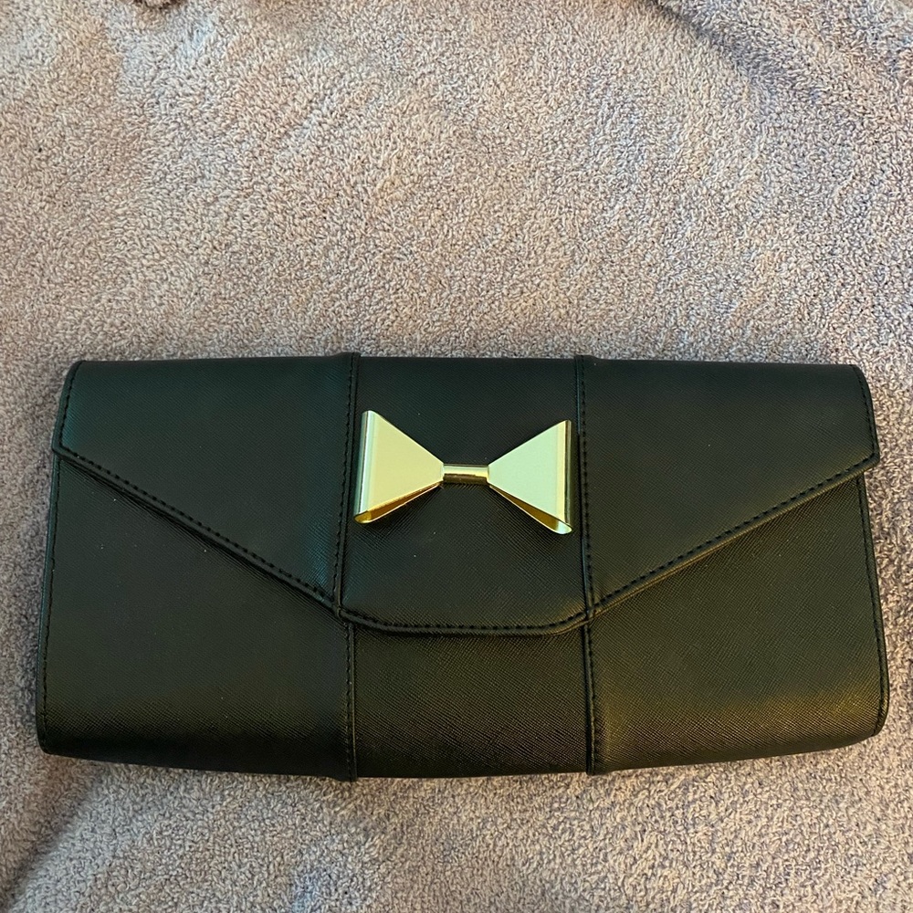 Black Clutch with Gold Bow and Gold Chain Strap